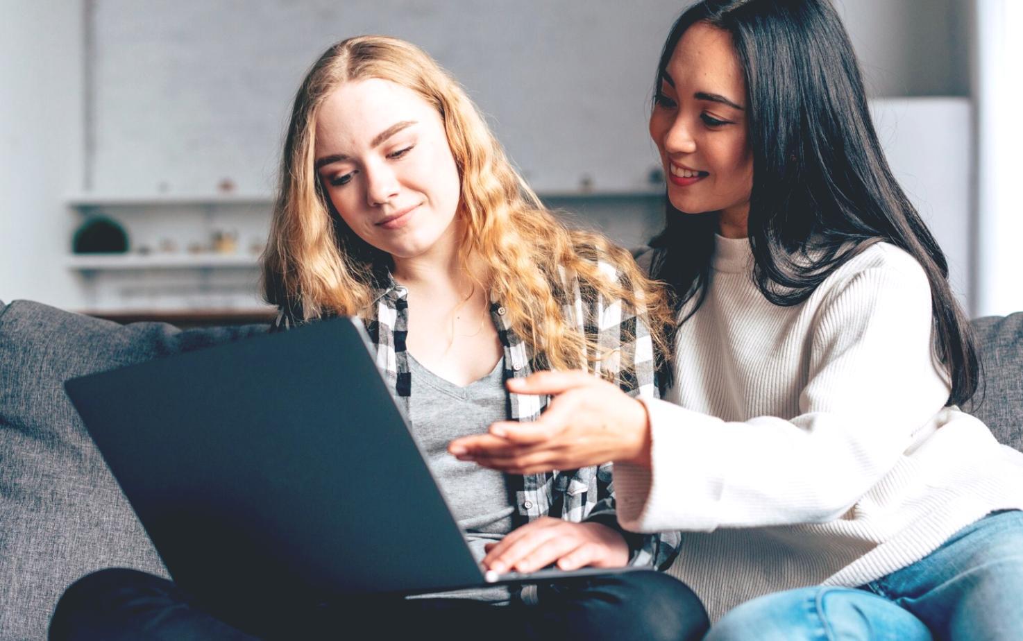 Students learning budget optimization techniques in modern classroom setting